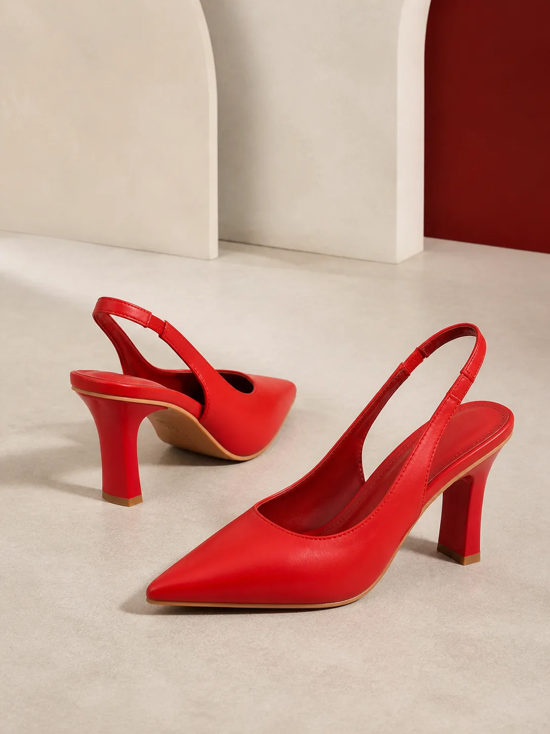 RED POINTED SLINGBACK FLARED HEELS