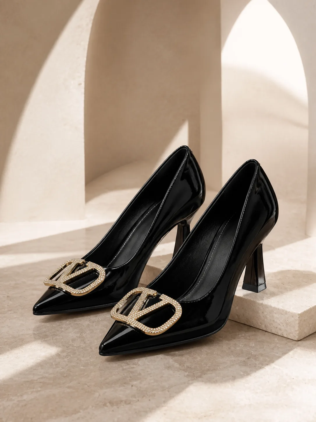 BLACK PATENT GOLD V BUCKLE POINTED PUMPS
